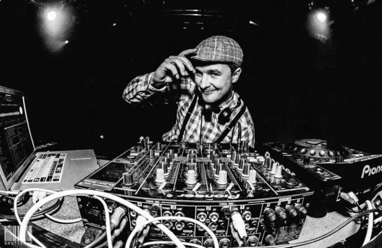 Mista Trick posing for a photo at his decks.