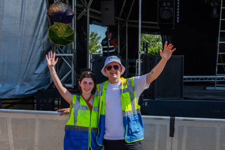 Two volunteers posing for a photo.