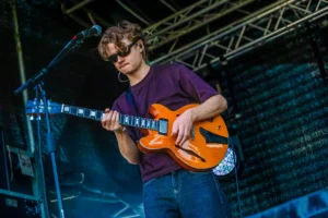 A guitarist on the Main Stage.